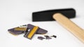 Broken computer processor on blurred background with hammer Royalty Free Stock Photo
