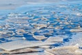 Fragments of ice on the river in sunny weather