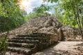 Fragments of a Mayan stone pyramid in the jungle of Coba