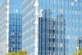 fragments multi-storey office and residential buildings in European city with reflective glass facades, modern high-rise office Royalty Free Stock Photo