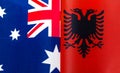 Fragments of the national flags of Australia and the Republic of Albania