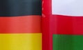 fragments of the national flags of Germany and Oman