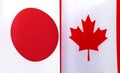 Fragments of the national flags of Japan and Canada