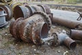 Fragments of old large pipes for heating mains