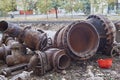 Fragments of old large pipes for heating mains