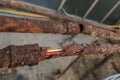 Fragments of old pipes ,metal pipe destroyed. Rusty steel tube