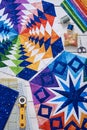 Fragments of quilt, accessories for patchwork, top view Royalty Free Stock Photo