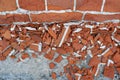 Fragments of red bricks near the old wall Royalty Free Stock Photo