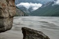 Fragments of rock over the full-flowing river.