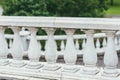 Fragments of white marble stone railings. Bridge guardrail Royalty Free Stock Photo