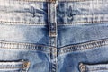 Fragmnt of denim trousers. The back of denim trousers, belt straps Royalty Free Stock Photo