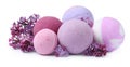 Fragrant bath bombs and lilac flowers on white background