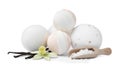 Fragrant bath bombs, salt, vanilla sticks and flower on white background