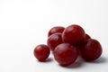 Fragrant berries of red grapes. Close-up. White background Royalty Free Stock Photo