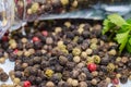 Fragrant black pepper on a white background