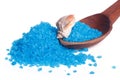 Blue bath salt and sea shell on a wooden spoon Royalty Free Stock Photo