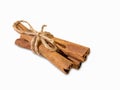 Fragrant cinnamon sticks isolated on a white background close-up. Oriental spices Royalty Free Stock Photo