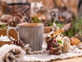 Fragrant coffee, chocolates in the form of Christmas figures. Cookies and hot drink for the holiday. Cozy atmosphere, candles Royalty Free Stock Photo