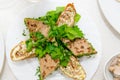 A fragrant liver cake, cut into pieces close-up.