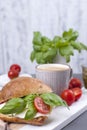 A fragrant morning coffee and a sandwich with mozzarella and basil for breakfast. Tasty and healthy food. Italian lunch. Copy Royalty Free Stock Photo