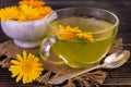 Fragrant tea from calendula flowers. Close-up. Royalty Free Stock Photo