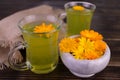 Fragrant tea from calendula flowers. Close-up. Royalty Free Stock Photo