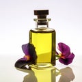 Fragrant yellow massage oil in bottles for SPA treatments and petals of spring flowers
