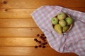 Frail of apples and pears on a towel and cherries on wooden table flat lay Royalty Free Stock Photo