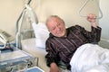 Frail senior man in a hospital bed Royalty Free Stock Photo