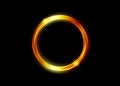 magic gold circle frame. Fire Hole. Glowing fire ring trace. Golden swirl trail effect on black background