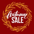 Frame with autumnal round full leaves wreath and Autumn Sale Lettering. Royalty Free Stock Photo