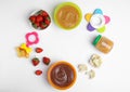 Frame of baby food, ingredients and toys on background, flat lay. Space for text Royalty Free Stock Photo