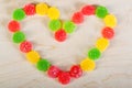 Frame a background colorful sweets of sugar candies