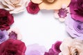 Frame of beautiful paper flowers on white background, flat lay. Space for text