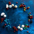 Frame of berries, candy and marshmallows Royalty Free Stock Photo