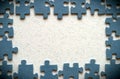 A frame of blue puzzle elements. Royalty Free Stock Photo