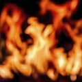 Frame of blurred bright burning hot fire flames against black background Royalty Free Stock Photo