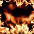 Frame of blurred bright burning hot fire flames against black background Royalty Free Stock Photo