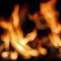 Frame of blurred bright burning hot fire flames against black background Royalty Free Stock Photo