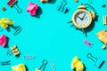 Frame border made of school stationery supplies and alarm clock. Copy space for your text or Educational greeting Royalty Free Stock Photo