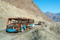 The frame of the burnt bus on the mountain road in Pakistan Royalty Free Stock Photo