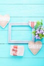 Frame for card and accessories on blue wooden background with co Royalty Free Stock Photo