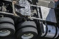 Frame and chassis of a big rig semi truck tractor with double wheels and a fifth wheel with a hitch in lubrication Royalty Free Stock Photo