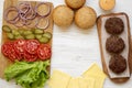 Frame of cheeseburger ingredients, top view Royalty Free Stock Photo