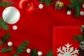 Frame of Christmas decoration on red background top view Royalty Free Stock Photo