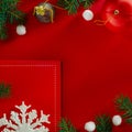 Frame of Christmas decoration on red background top view