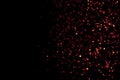 Frame of christmas digital glitter sparks golden and red particles vertical strips flowing on black background, holiday event