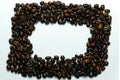 Frame coffee bean with pictures beautifu.l background view from the side wooden table. The concept Royalty Free Stock Photo