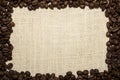 Frame from coffee beans on burlap Royalty Free Stock Photo