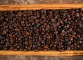 Frame with coffee beans and celyon cinnamon Royalty Free Stock Photo
